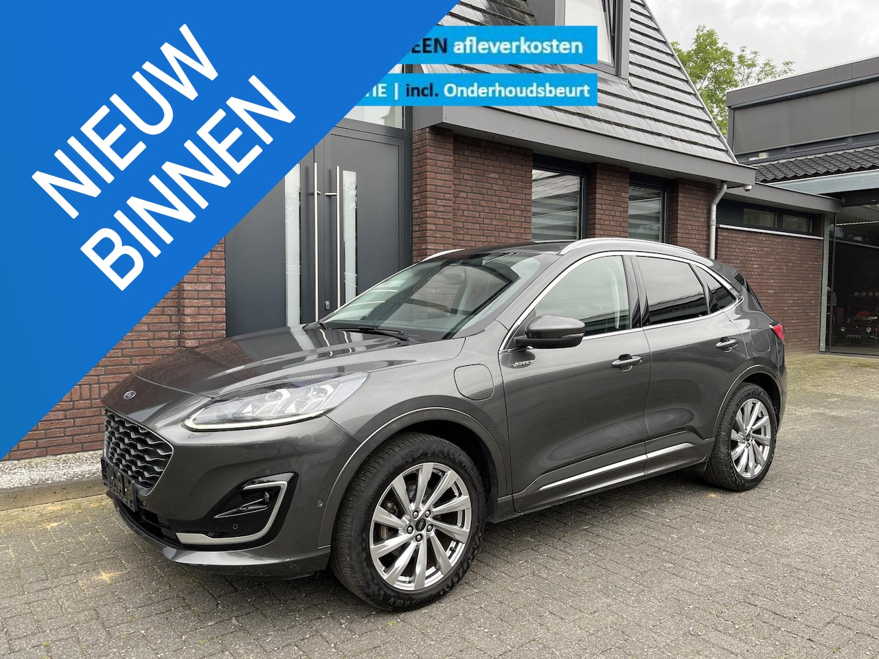 Ford Kuga - 2.5 PHEV Vignale NAV | TREKHAAK WEGKLAPB. | LEDER | LED | ELEC. A.KLEP | ADAPTIVE CRUISE C - AutoWereld.nl