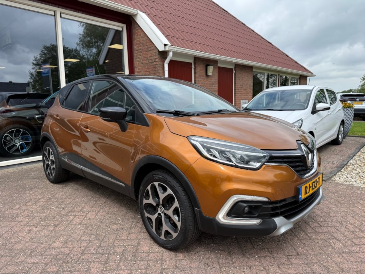 Renault Captur - 0.9 TCE INTENS AIRCO/ECC/NAVIGATIE/PDC/TREKHAAK - AutoWereld.nl