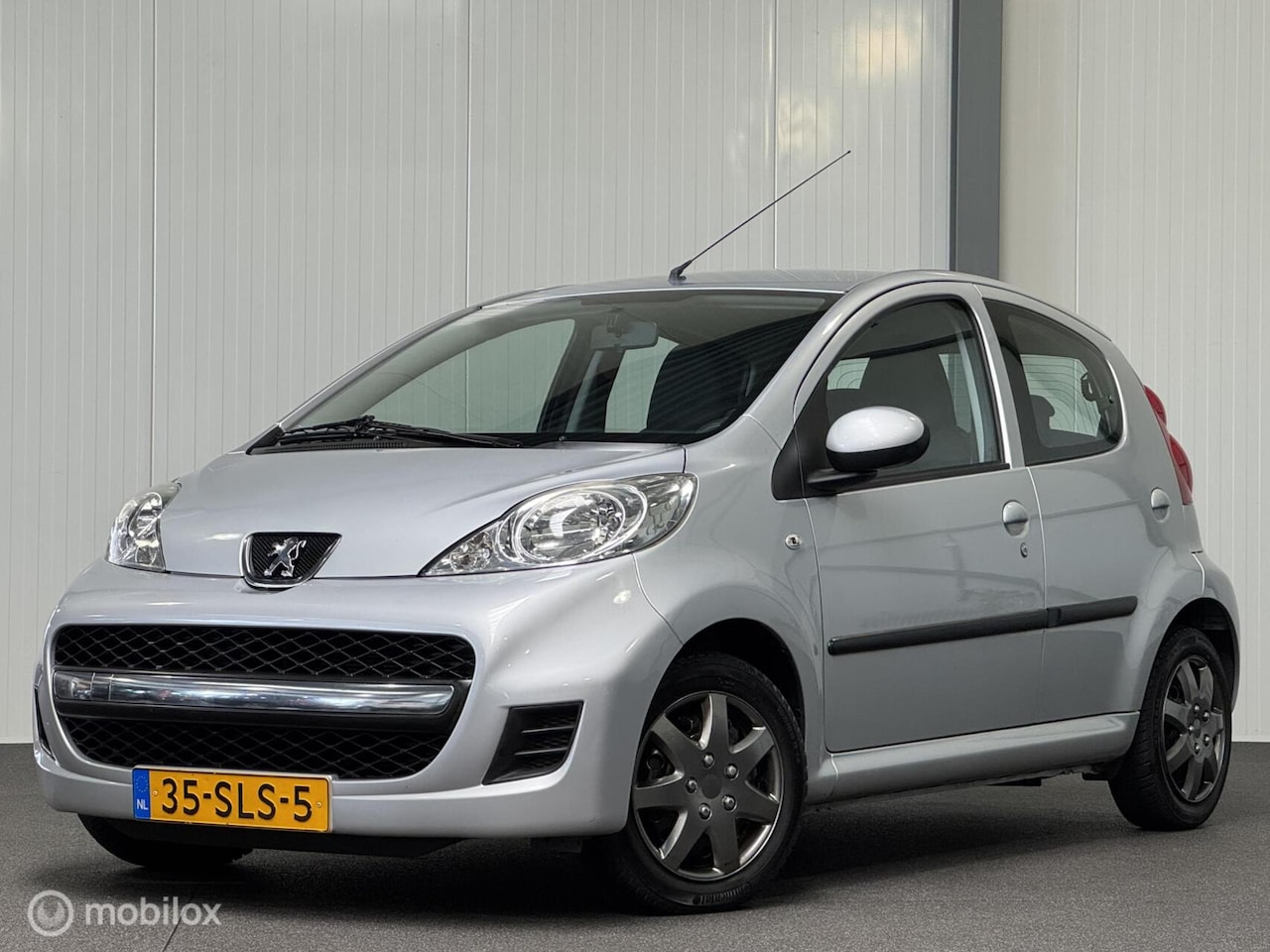 Peugeot 107 - 1.0-12V XS 5-drs [ NAP airco ] - AutoWereld.nl