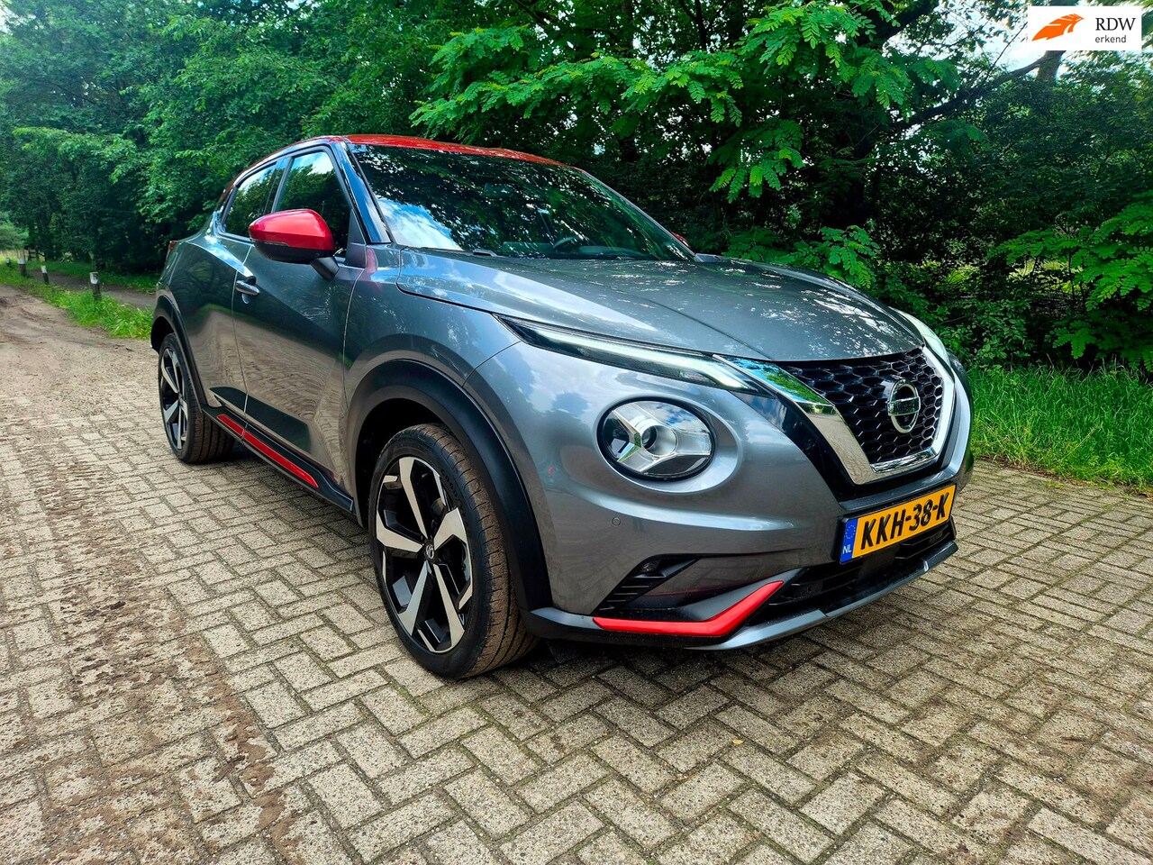 Nissan Juke - 1.0 DIG-T Tekna / BOSE geluid / 19 inch - AutoWereld.nl