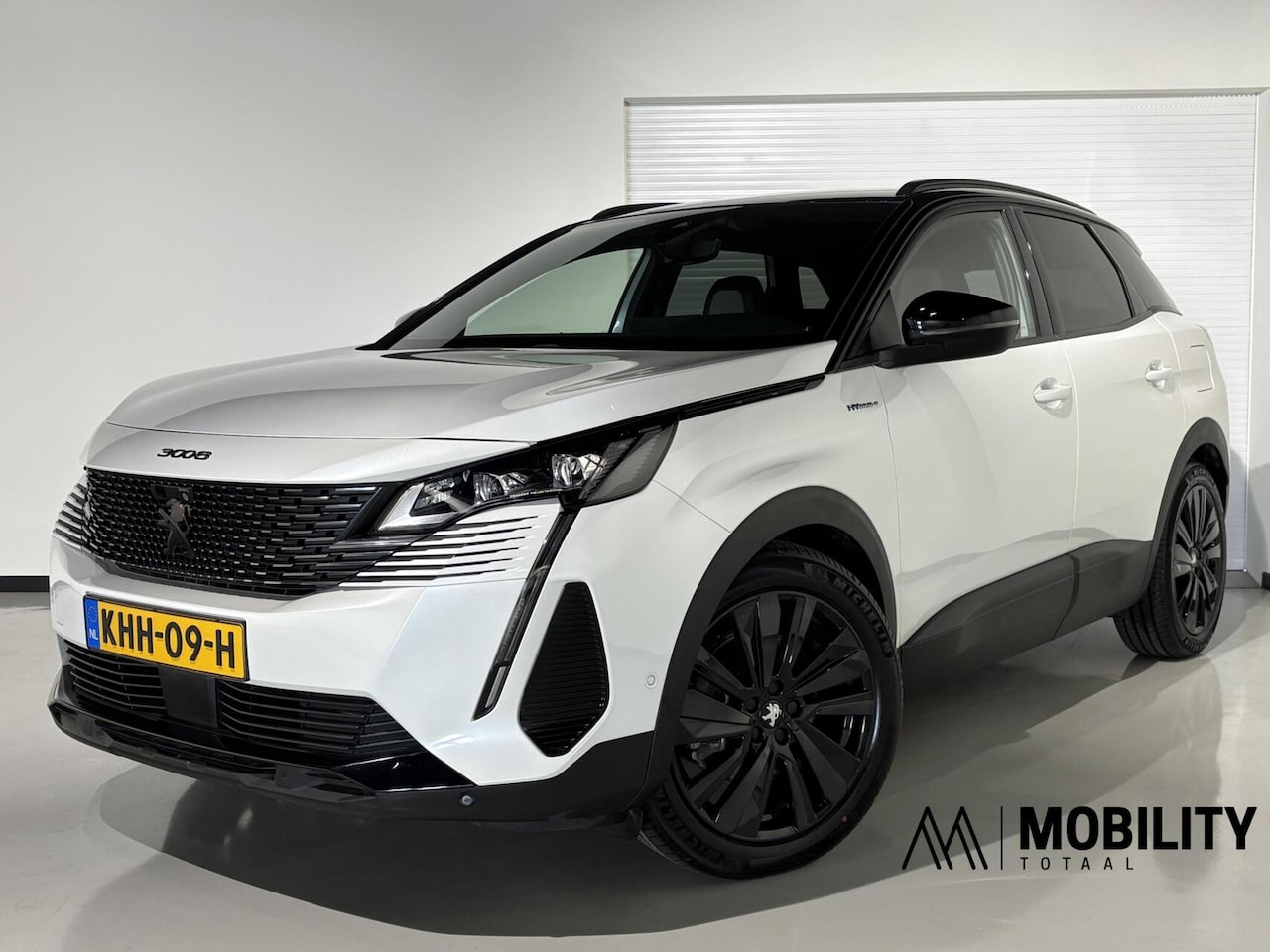 Peugeot 3008 - 1.6 PHEV HYbrid4 300pk GT|Black Pack|Massage +Memory|360|FOCAL|Carplay|Navi|PDC|ACC|Side a - AutoWereld.nl