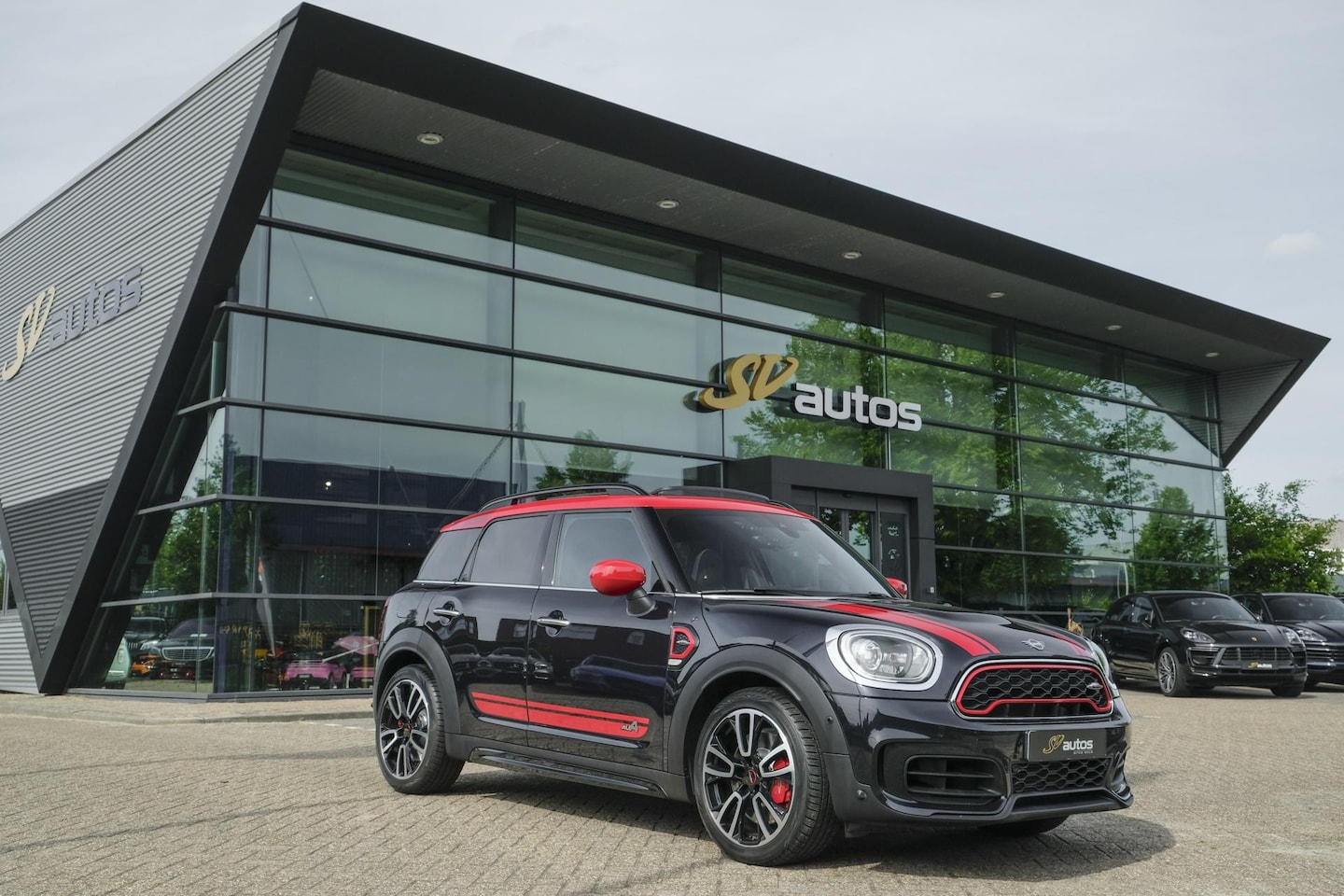 MINI Countryman - 2.0 John Cooper Works 306pk ALL4 JCW Panoramadak Harman/Kardon Camera DAB NLauto NAP - AutoWereld.nl