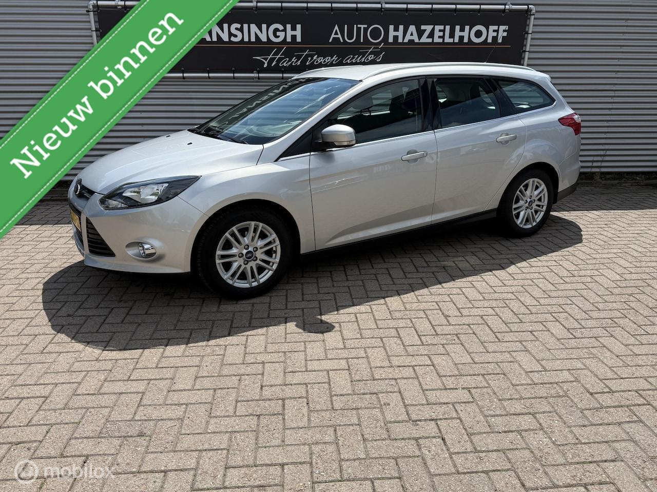 Ford Focus Wagon - 1.0 Ecoboost Titanium slechts 114.209km | Clima | Verwarmde Voorruit | Trekhaak | PDC Acht - AutoWereld.nl