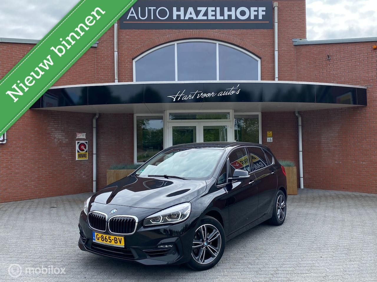 BMW 2-serie Active Tourer - 218i High Executive Edition | Stoelverwarming | PDC V+A | Navigatie | Cruise | Trekhaak | - AutoWereld.nl
