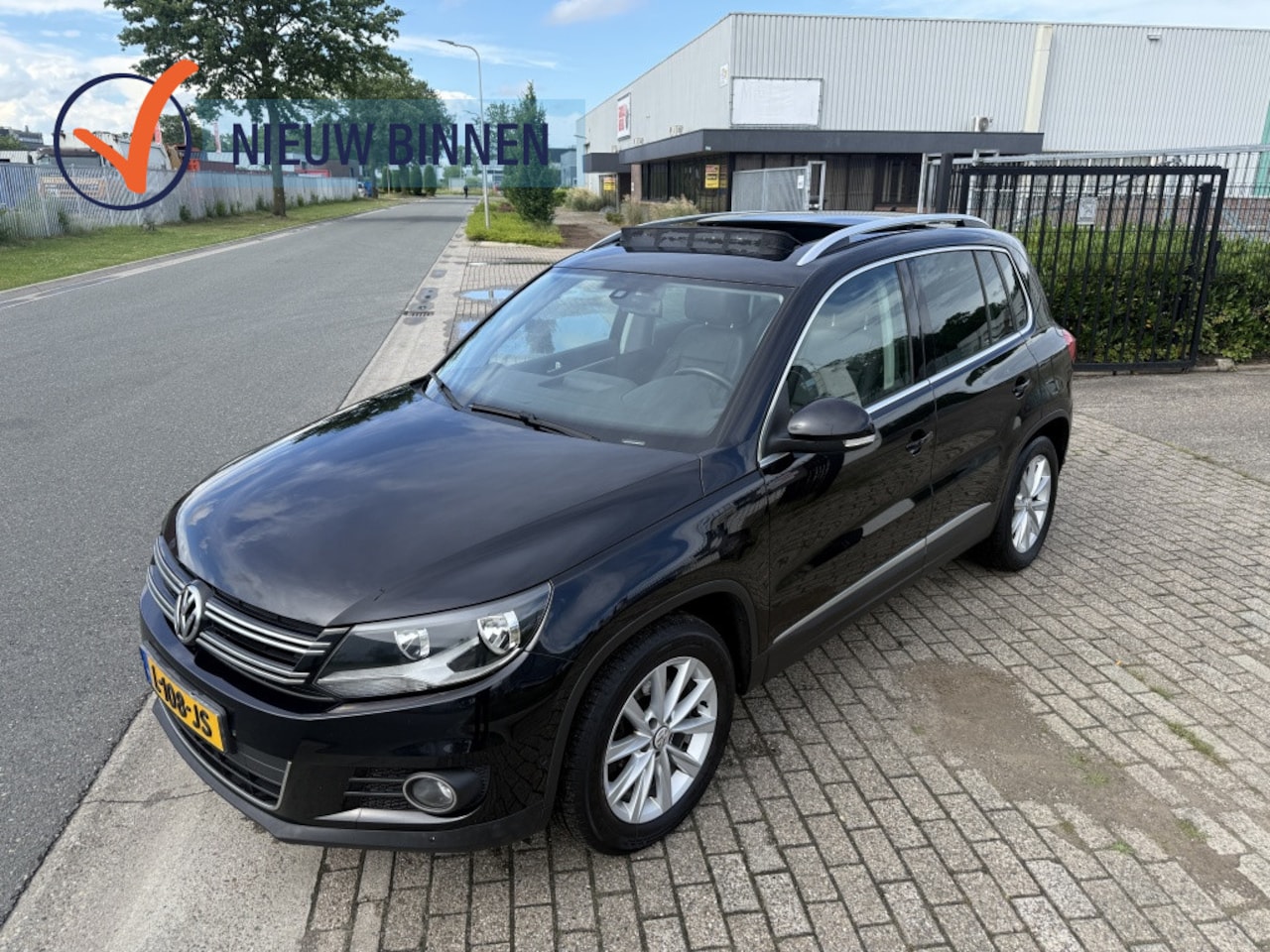 Volkswagen Tiguan - 1.4 TSI Sport&Style - AutoWereld.nl