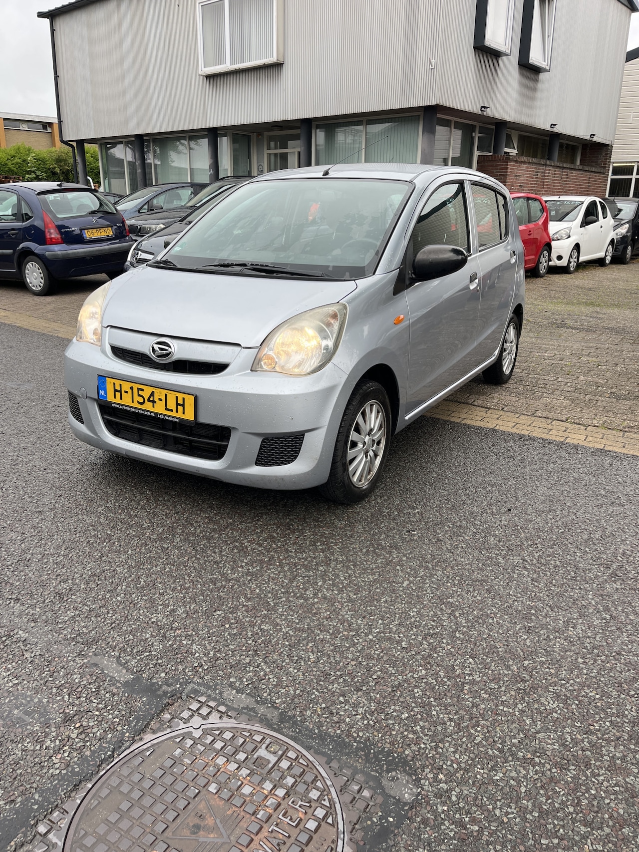Daihatsu Cuore - 1.0 Clever S 5 Deurs,Airco Apk 31-07-2027 Zeer nette en Super zuinige Cuore. - AutoWereld.nl