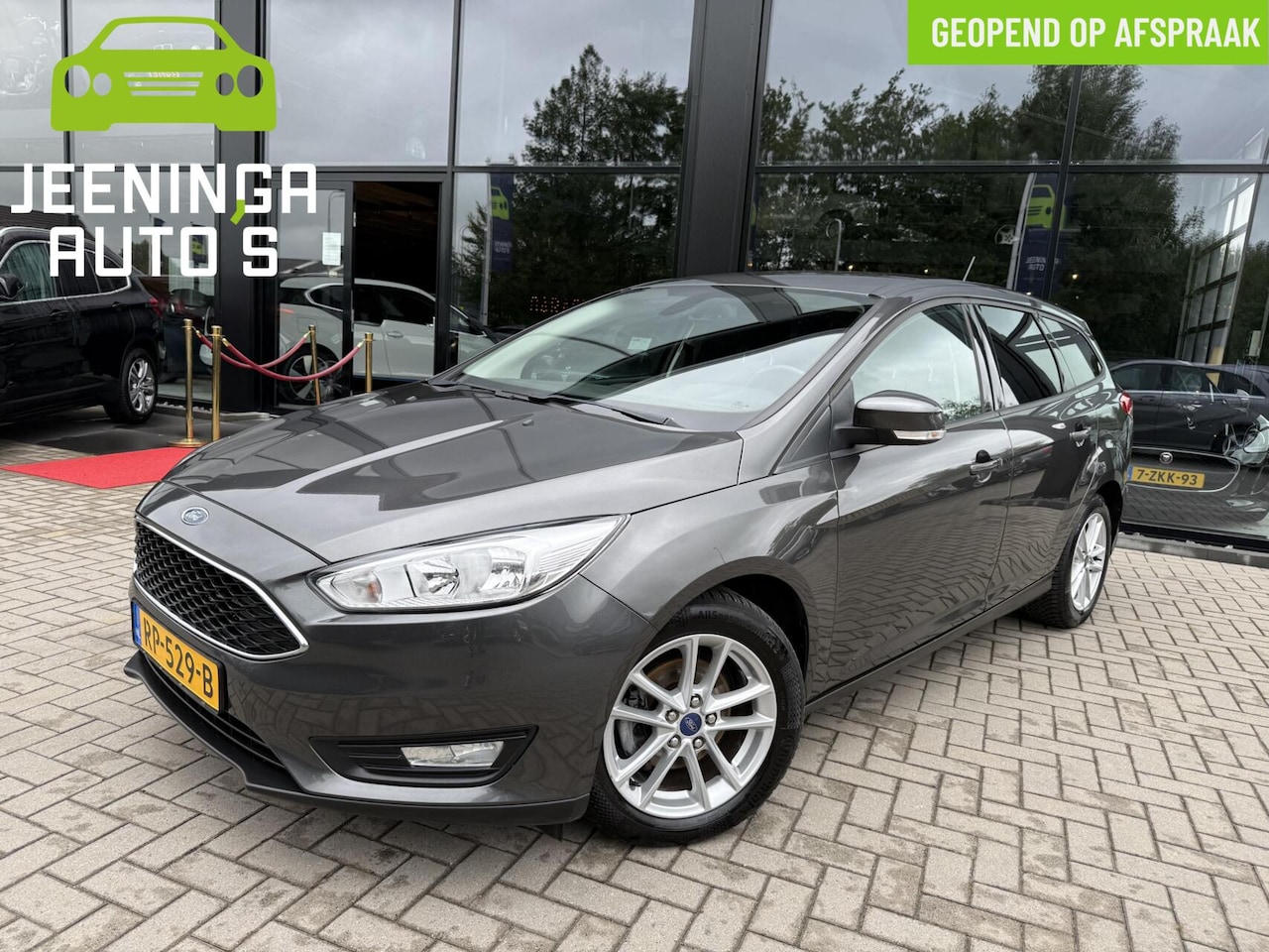 Ford Focus Wagon - 1.0 Titanium|Clima|Navi|Trekhaak - AutoWereld.nl