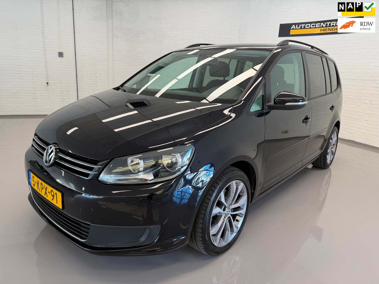 Volkswagen Touran - 1.6 TDI Comfortline 105 Pk 7 persoons Airco Navi Pdc EXPORT - AutoWereld.nl