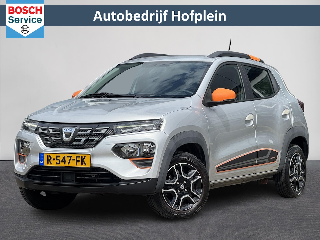 Dacia Spring - Comfort Plus (Orange Pack) 27 kWh 1e Eigenaar | Elektrisch | Airco | LM-Velgen | Dakrail - AutoWereld.nl