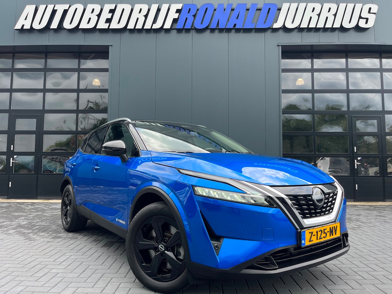 Nissan Qashqai - 1.5 e-Power Business Executive Two-Tone/Hybrid/Trekhaak/Camera/Carplay/Climatronic/1Ste Ei - AutoWereld.nl