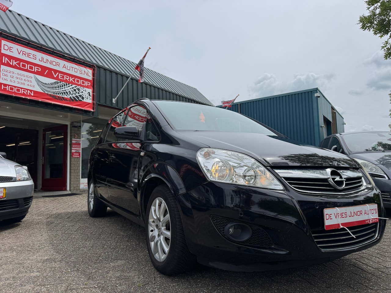 Opel Zafira - 1.6 Temptation. 7-persoons, airco, pdc en een nieuwe apk! - AutoWereld.nl