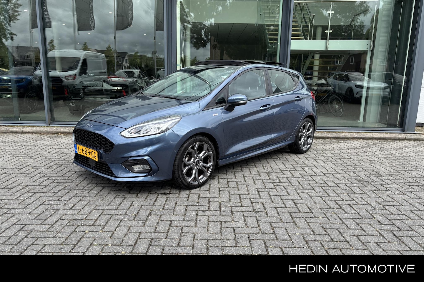 Ford Fiesta - 1.0 EcoBoost Hybrid ST-Line X | Panoramadak | Winter Pack | Navigatie | PDC | - AutoWereld.nl