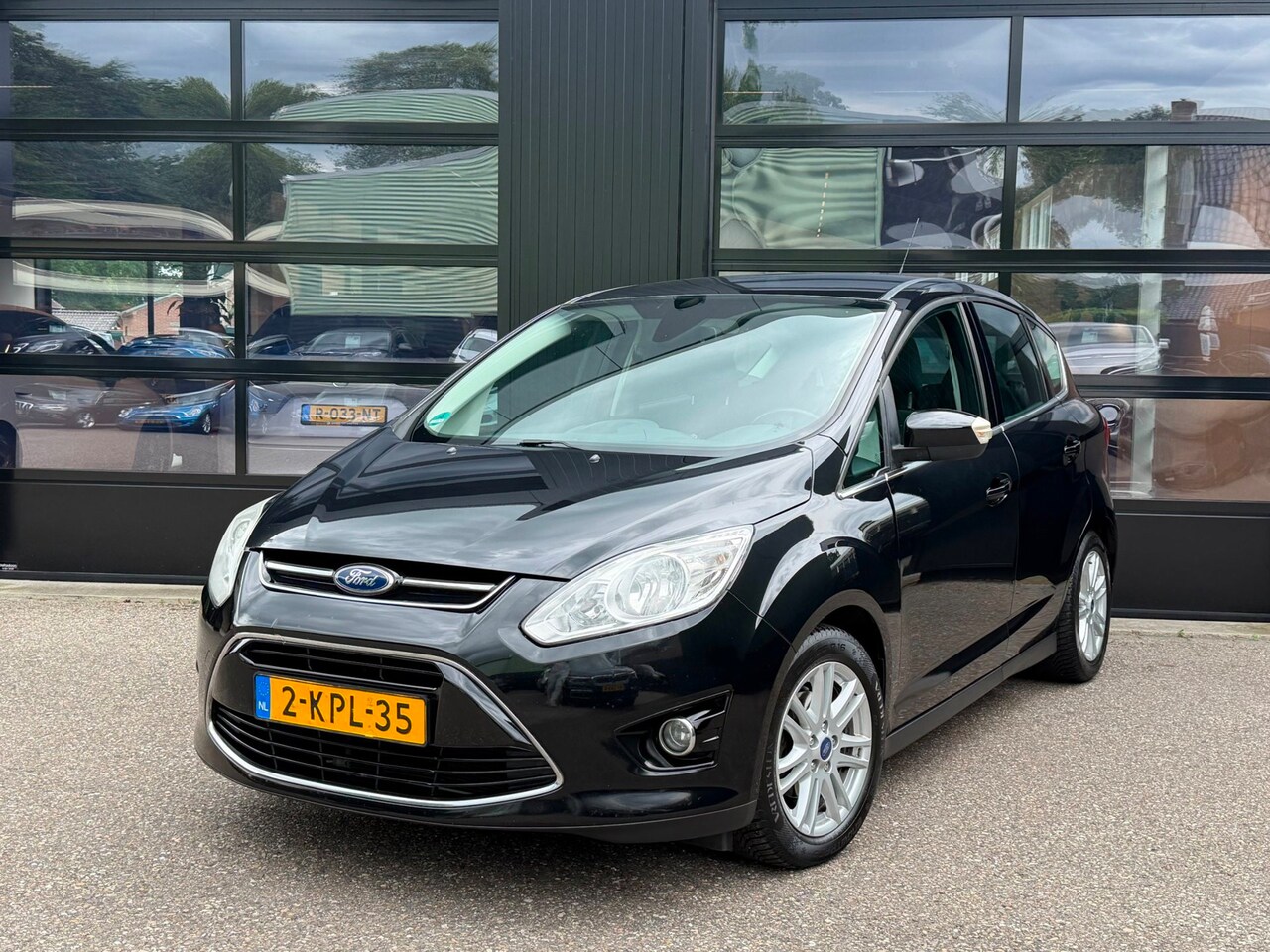 Ford C-Max - 1.6 TDCi Titanium Clima Navi Cruise PDC - AutoWereld.nl
