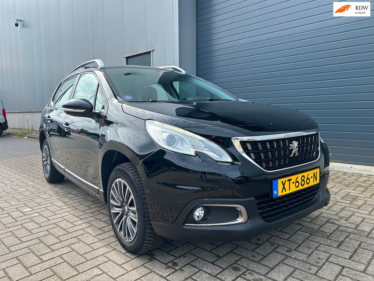 Peugeot 2008 - 1.2i PureTech Executive AIRCO NAVI PDC 2016 - AutoWereld.nl