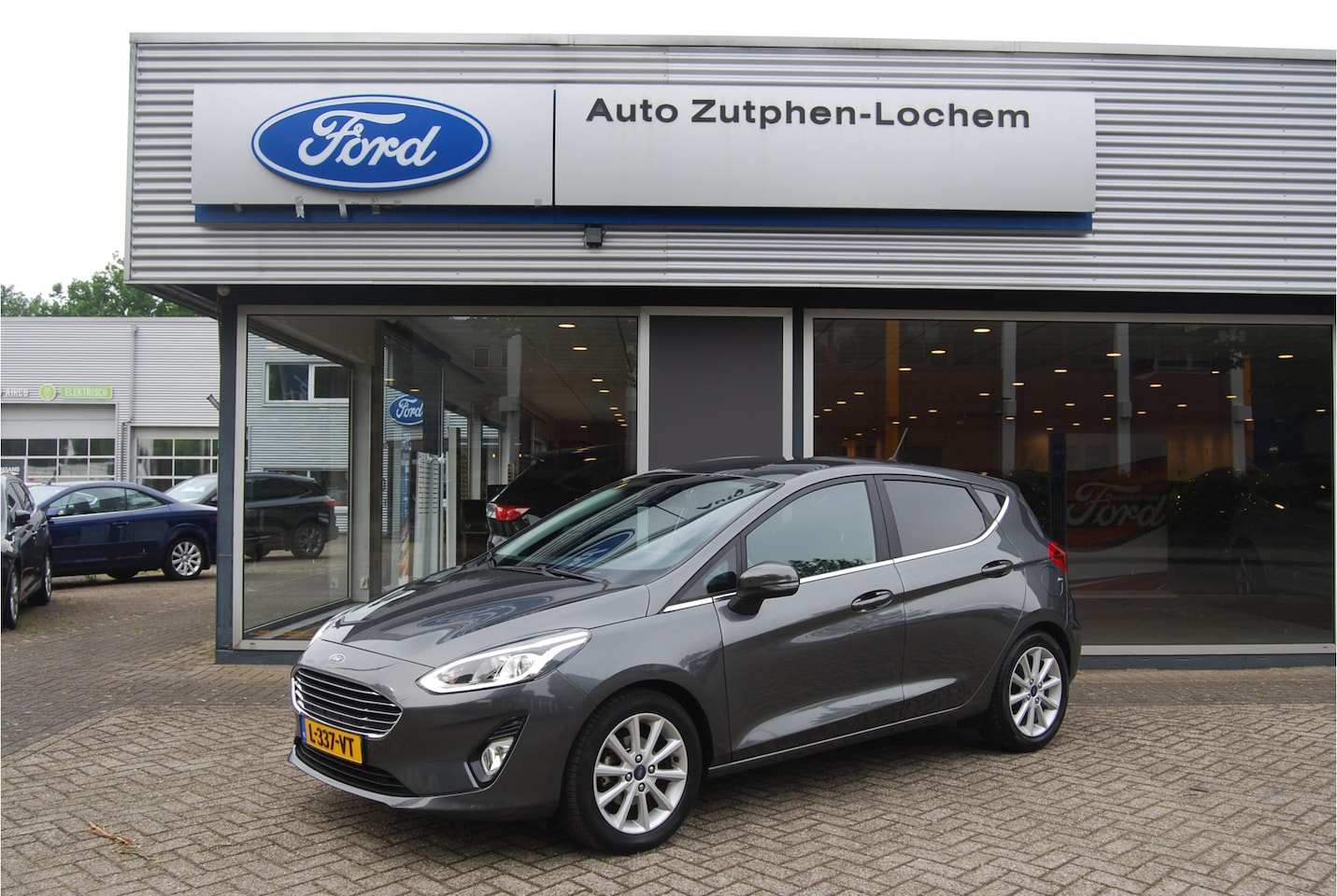 Ford Fiesta - 1.0 EcoBoost Titanium 100pk 5dr AUTOMAAT | NAVI | APPLE/ANDRIOD | CLIMATE | CRUISE COTNROL - AutoWereld.nl