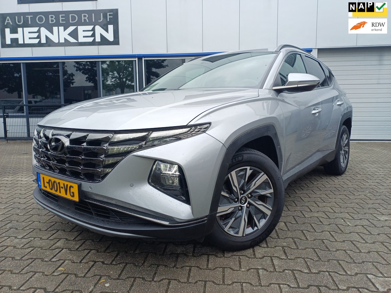 Hyundai Tucson - 1.6 T-GDI HEV Comfort LED/NAVI/CRUISE/CAMERA/CLIMA - AutoWereld.nl