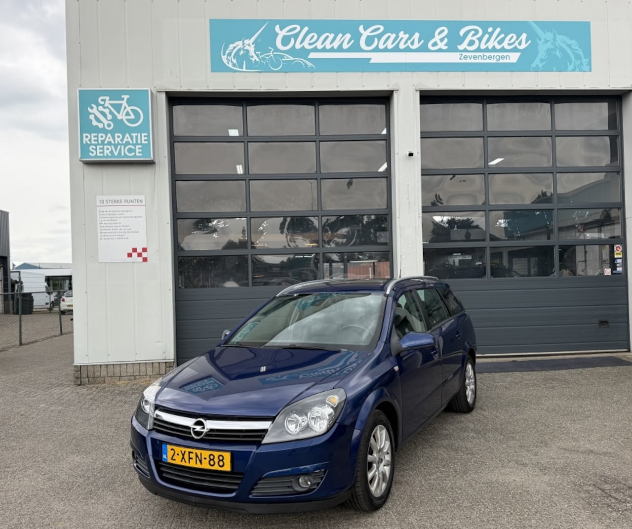 Opel Astra Wagon - Panorama dak / leer 1.8 Essentia - AutoWereld.nl
