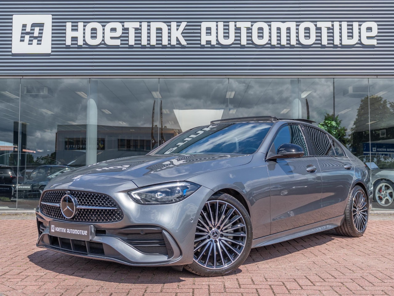 Mercedes-Benz C-klasse - 300 AMG Line | Pano | Ambiente | Night - AutoWereld.nl