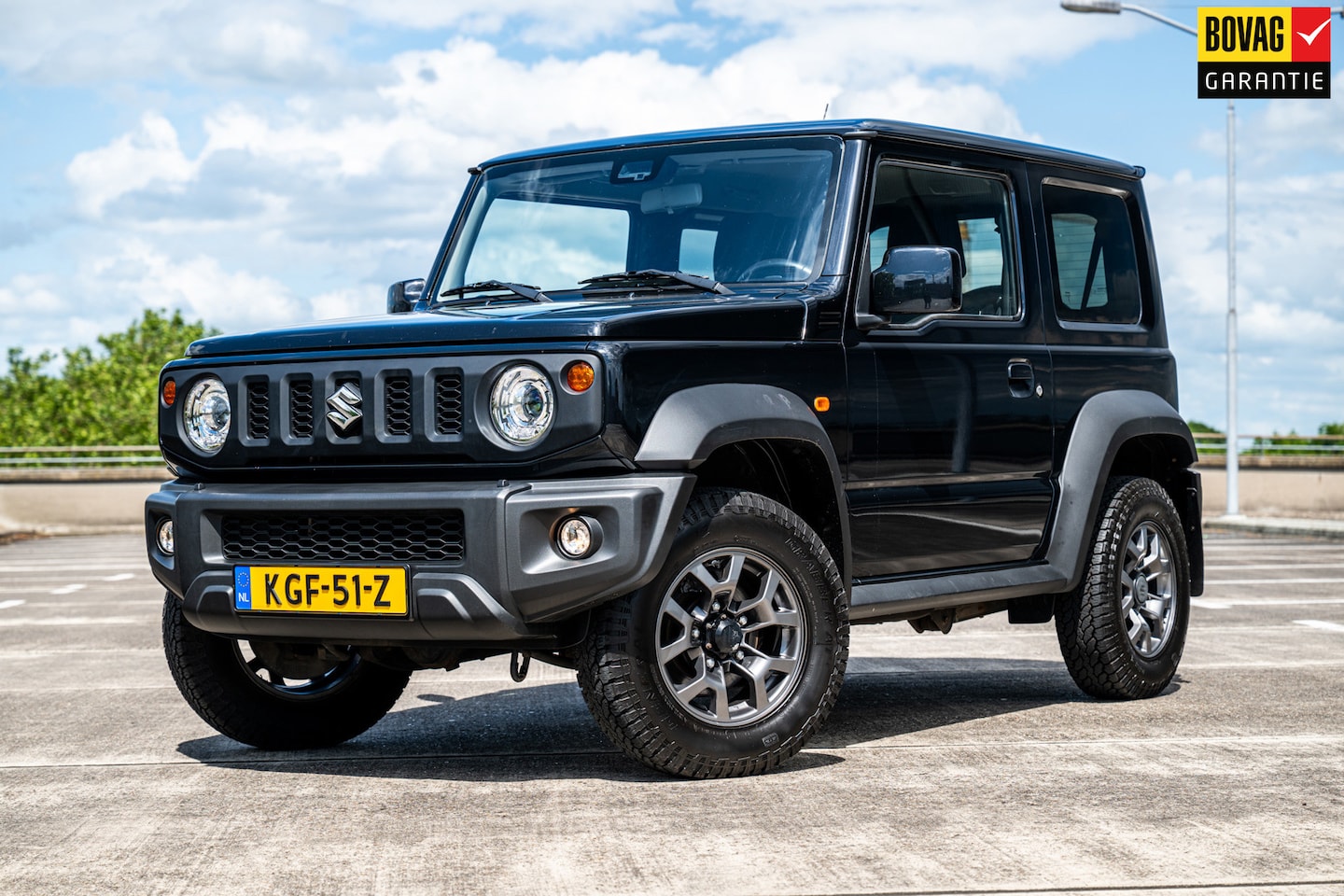 Suzuki Jimny - 1.5 Stijl | 4 Persoons | Airco/Clima | Cruise Control | Navigatie | Stoelverwarming | Trek - AutoWereld.nl
