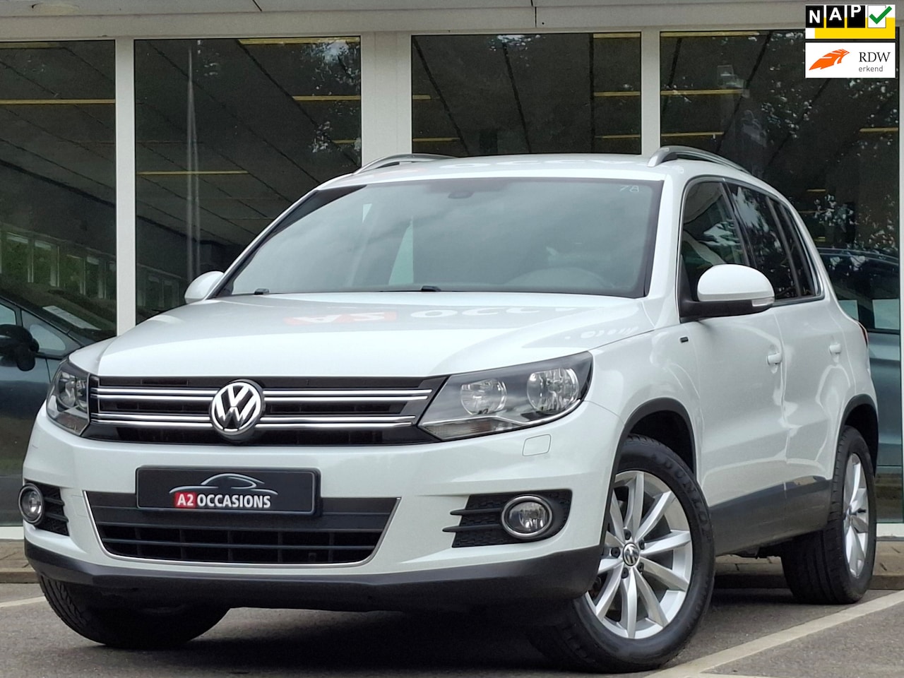 Volkswagen Tiguan - 1.4 TSI Sport en Style Cruise/Navi/Bluetooth/Camera - AutoWereld.nl