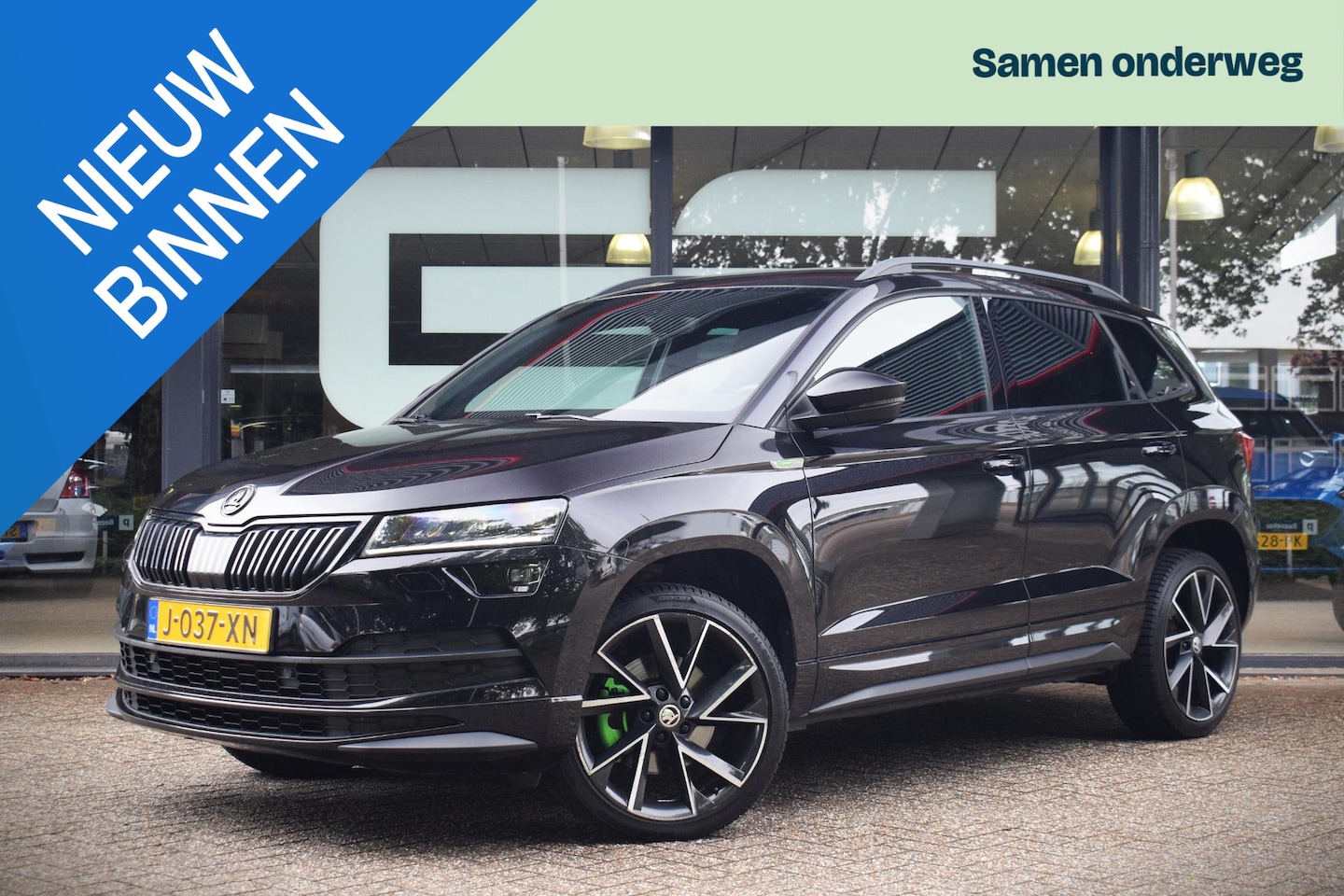 Skoda Karoq - 1.5 TSI ACT Sportline Business met TREKHAAK|NAVIGA - AutoWereld.nl