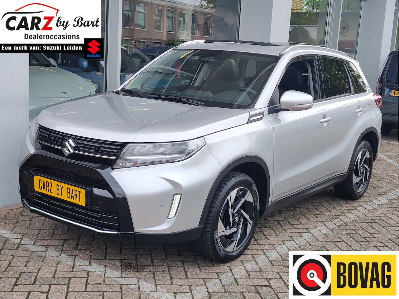 Suzuki Vitara - 1.4 BOOSTERJET STYLE SMART HYBRID Open dak | Draadloze Carplay/Android | Dodehoeksensoren - AutoWereld.nl