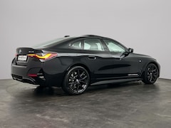BMW i4 - eDrive35 70 kWh | Trekhaak | Schuifdak | Stoelverwarming | Stuurverwarming | Hifi |