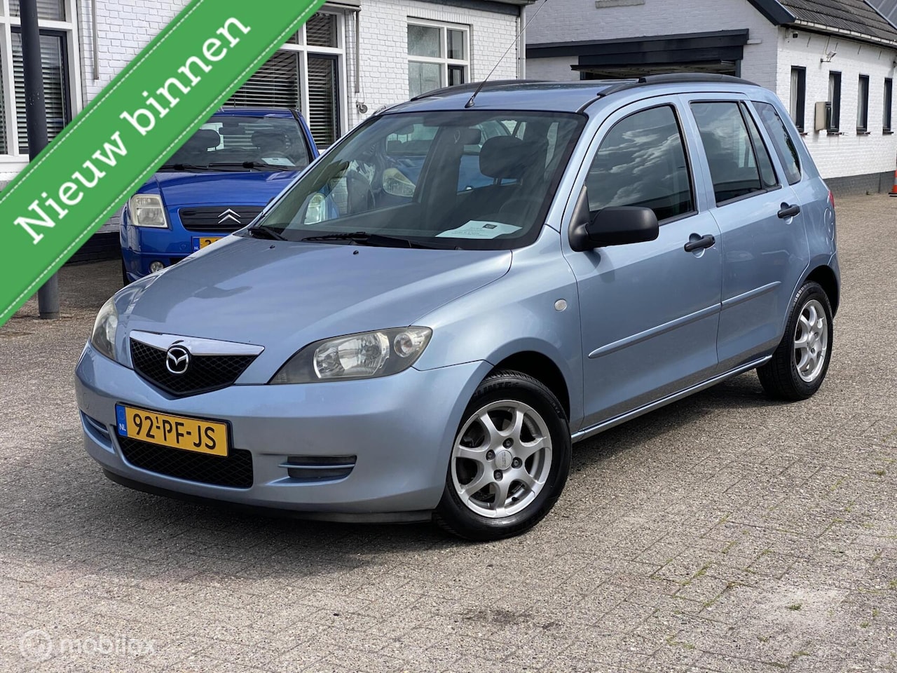 Mazda 2 - 1.4 Exclusive / Apk 4-2027 / 123.dkm / Trekhaak - AutoWereld.nl