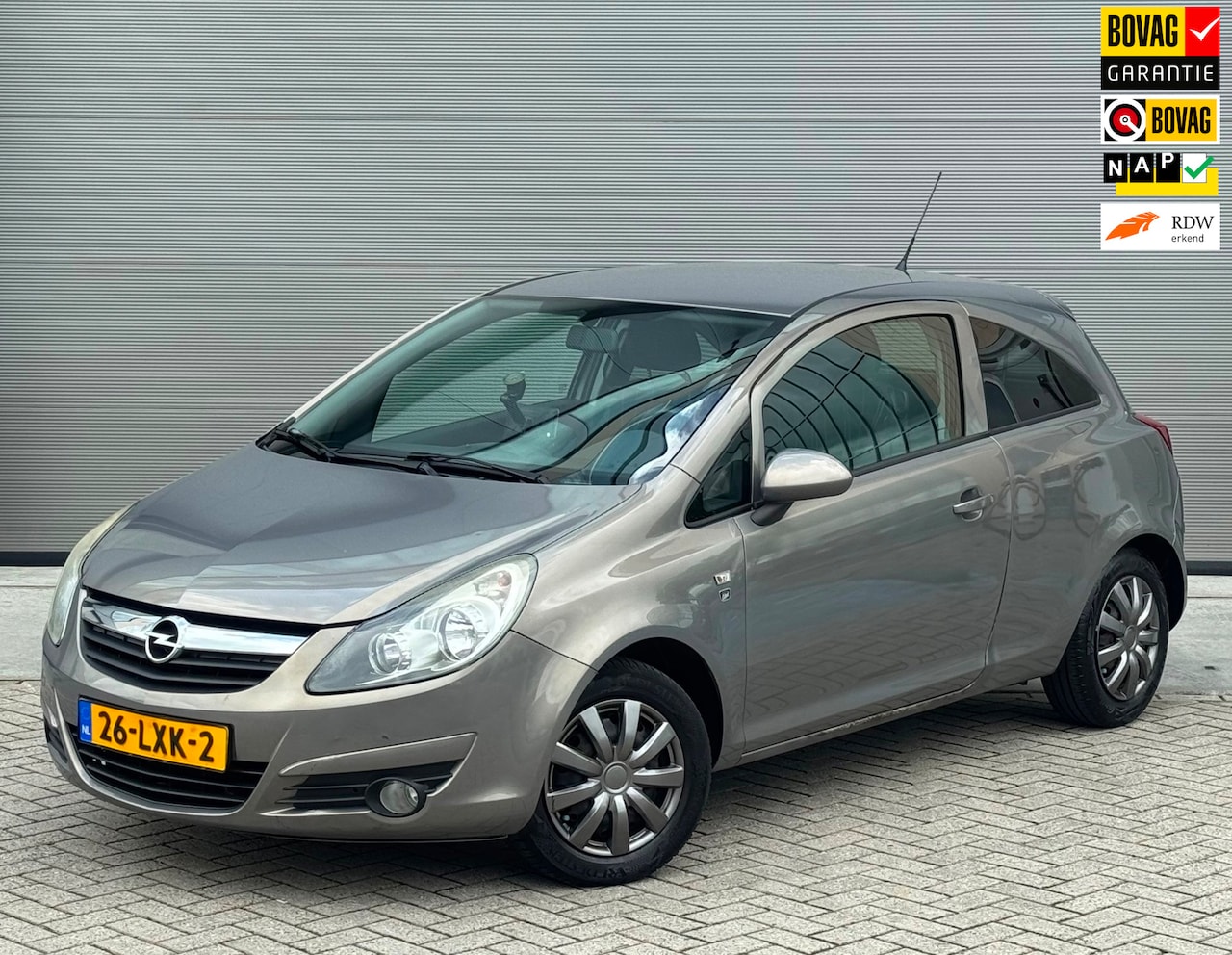 Opel Corsa - 1.2-16V 3D AUT 2010 Bruin NAP|AIRCO|CRUISE - AutoWereld.nl