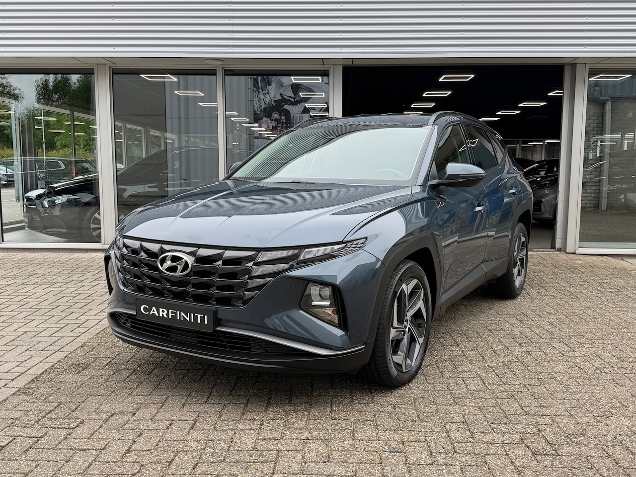 Hyundai Tucson - 1.6 T-GDI PHEV Comfort 4WD 265 Pk | Navigatie | Cruise | Clima | Camera | Side assist | 19 - AutoWereld.nl