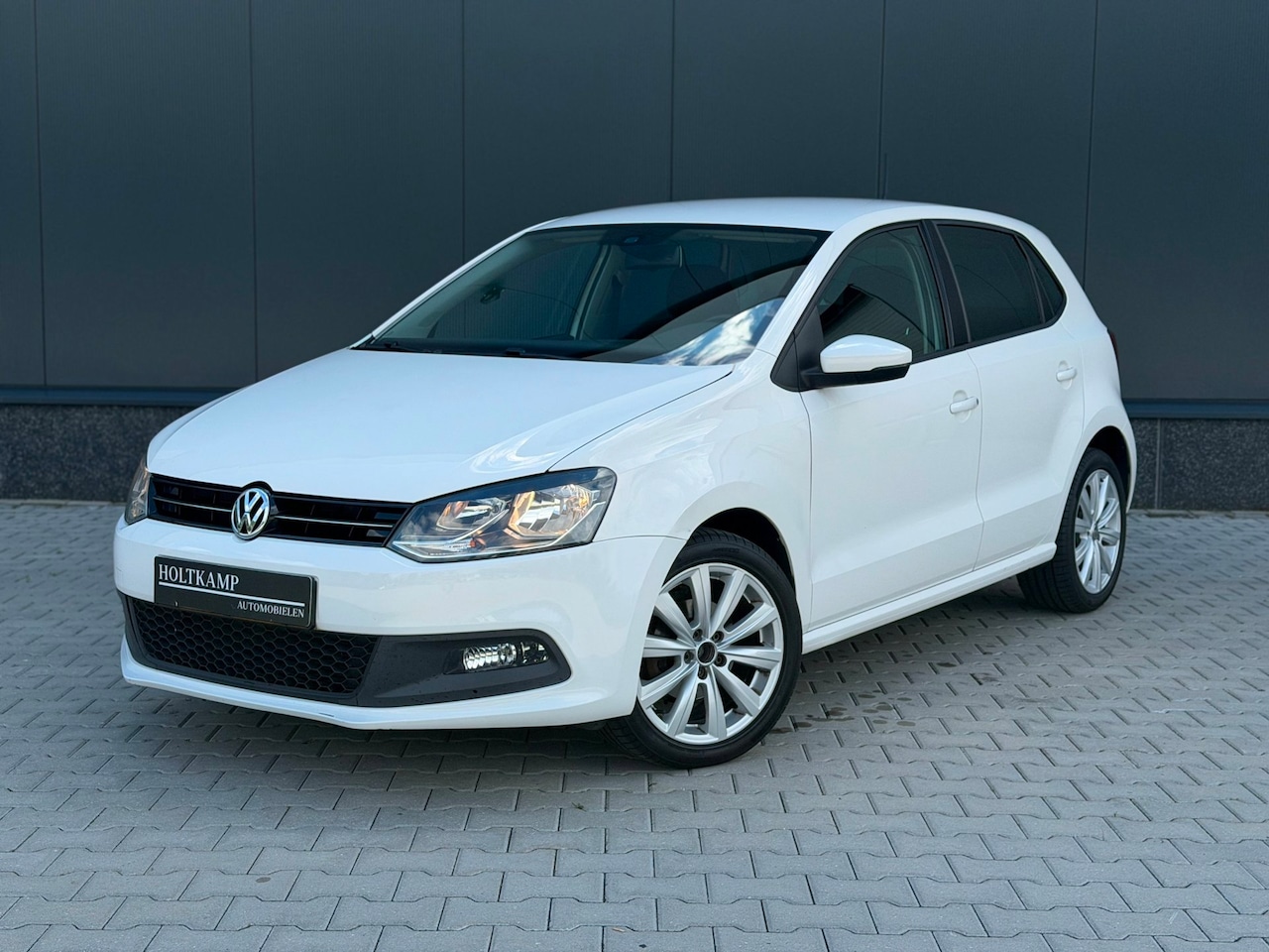 Volkswagen Polo - 1.4-16V TEAM | AIRCO | CRUISE | CARPLAY | STOELVERWARMING - AutoWereld.nl