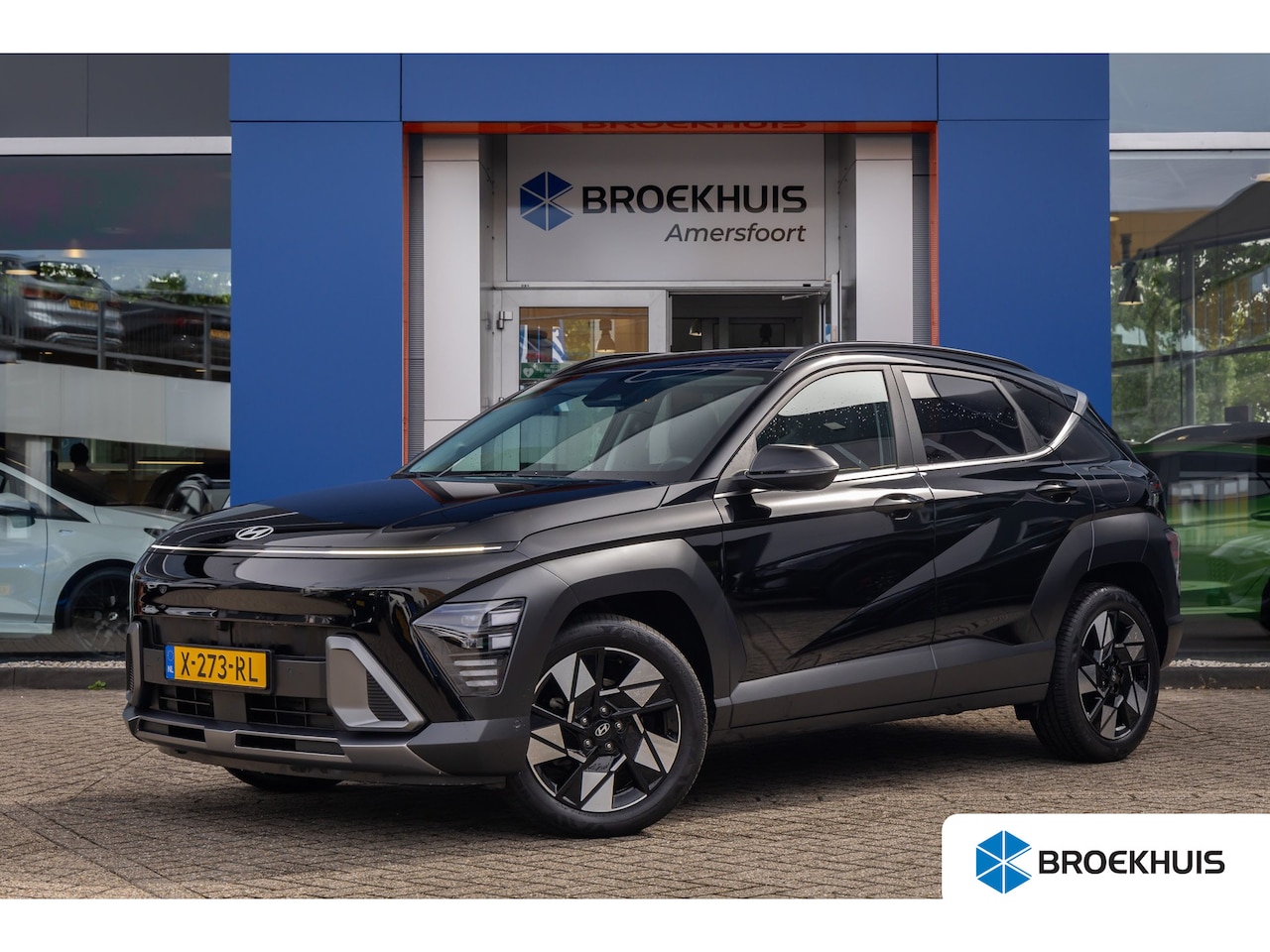 Hyundai Kona - 1.6 GDI HEV Premium | Cruise adaptief | 360 camera | Stoel verwarming+ventilatie | Elektri - AutoWereld.nl
