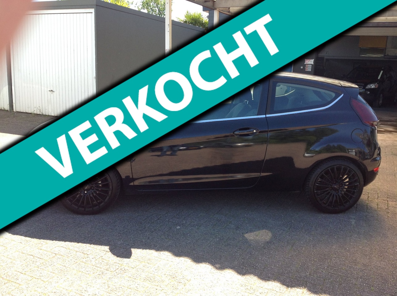Ford Fiesta - 1.25 Titanium airco el ramen apk sportvelgen - AutoWereld.nl