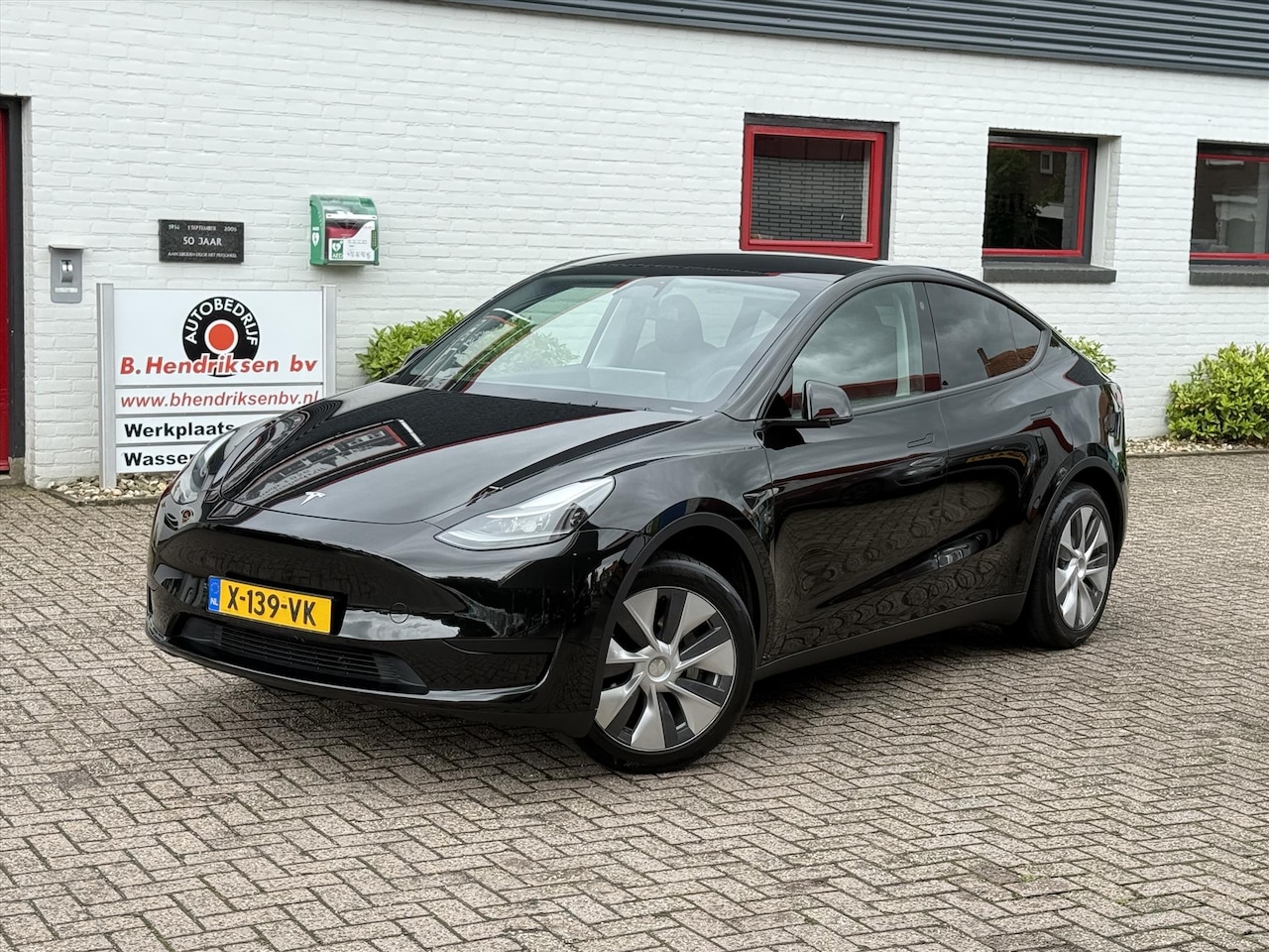 Tesla Model Y - RWD 58KWH/ LFP accu/ Warmtepomp/ Panoramadak/ 1 Eigenaar/ Origineel NL/ NAP - AutoWereld.nl
