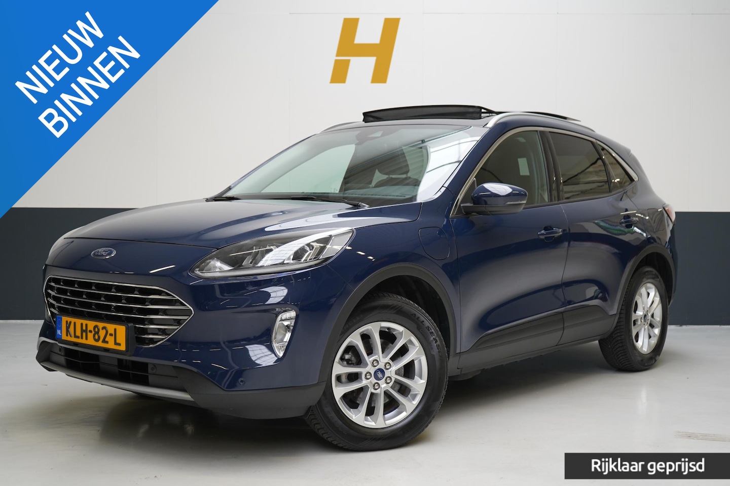 Ford Kuga - 2.5 PHEV Titanium | SoH 96% | Panoramadak | Carplay | Stoelverwarming | Keyless | Lm velge - AutoWereld.nl