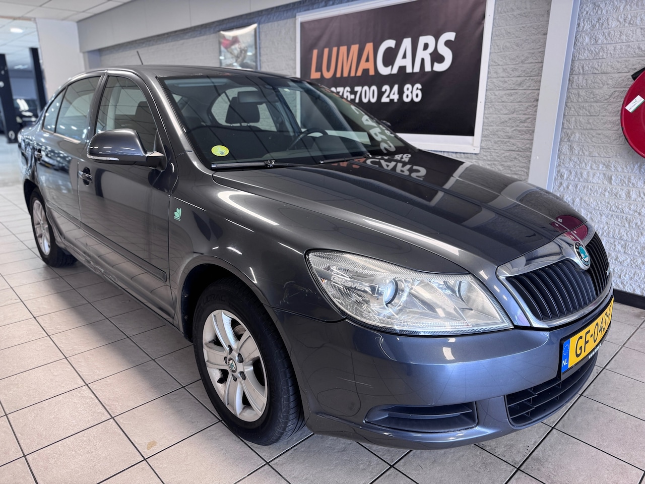 Skoda Octavia - 1.6 TDI Greentech Go | Cruise | Airco | Navi | - AutoWereld.nl