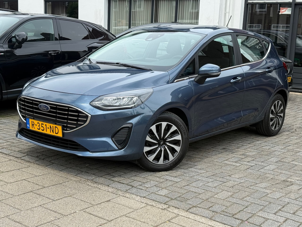 Ford Fiesta - 1.0 EcoBoost Hybrid Titanium 1.0 EcoBoost Hybrid Titanium, Apple Carplay/Android,Navigatie,Cruise control,Parkeersensor - AutoWereld.nl