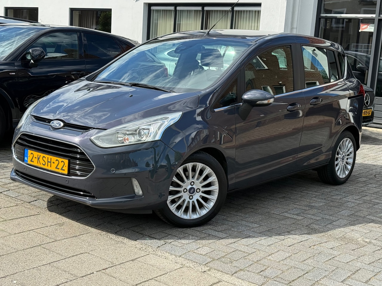 Ford B-Max - 1.0 EcoBoost Titanium 1.0 EcoBoost Titanium, Navigatie,Parkeersensoren,Achteruitrij camera,Cruise control - AutoWereld.nl