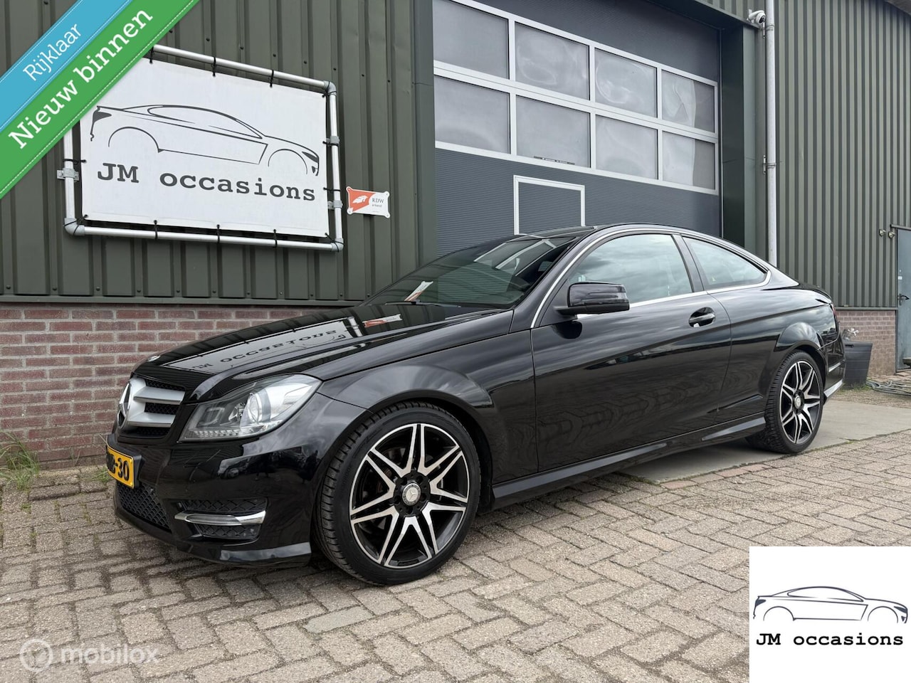 Mercedes-Benz C-klasse Coupé - 180 AMG|Xenon|Navi|Cruise|F1 flippers| - AutoWereld.nl