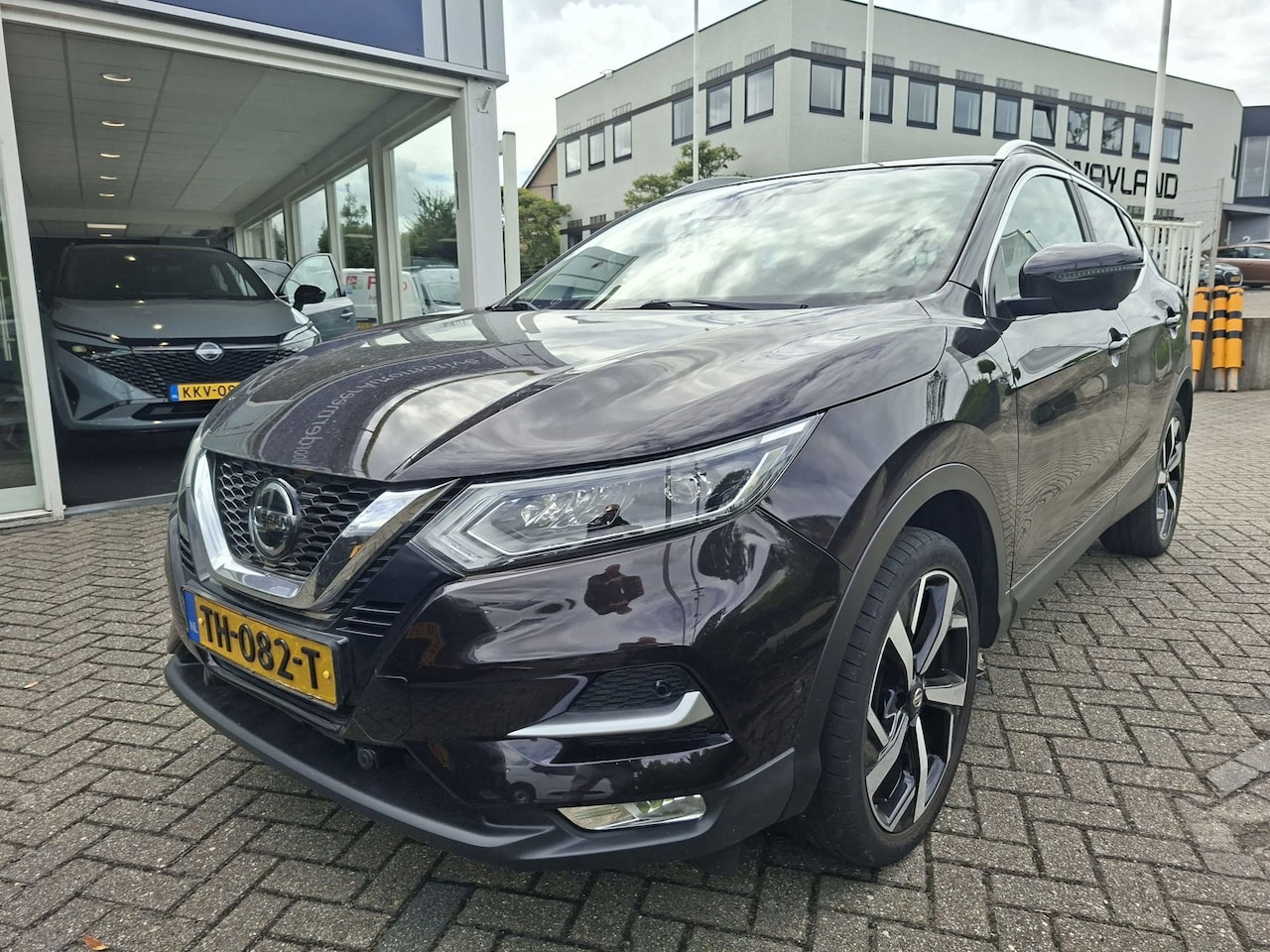 Nissan Qashqai - 1.2 Tekna panoramadak / navi / camera - AutoWereld.nl