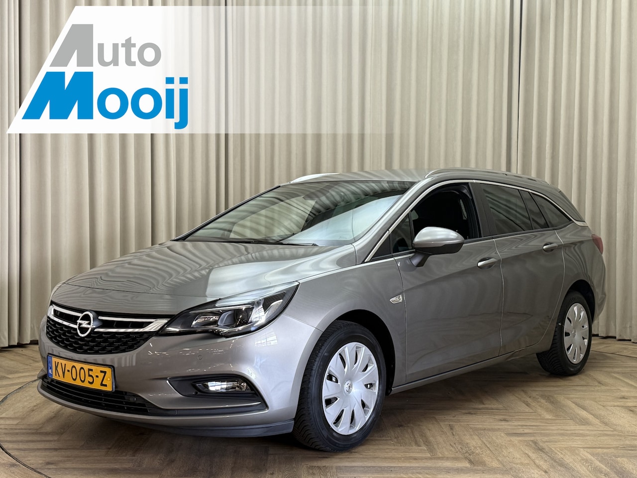 Opel Astra Sports Tourer - 1.0 Business+ Carplay / Navigatie / Cruise / PDC V&A / Airco - AutoWereld.nl