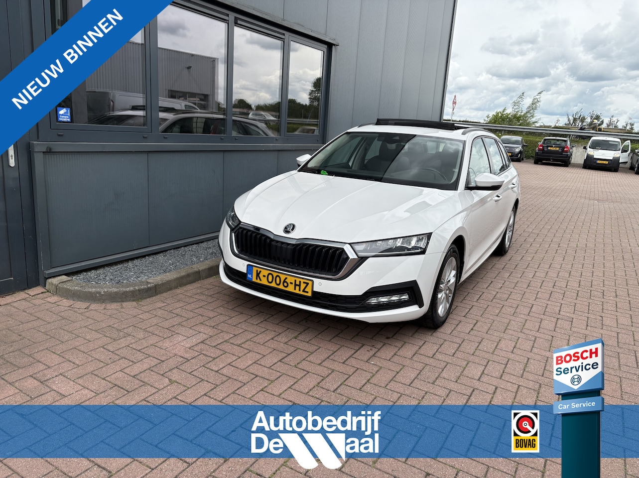Skoda Octavia Combi - 1.0 TSi Business Edition PANORAMDAK/CAMERA/ADAPT.CRUISE/PDC/WINTERPACK - AutoWereld.nl