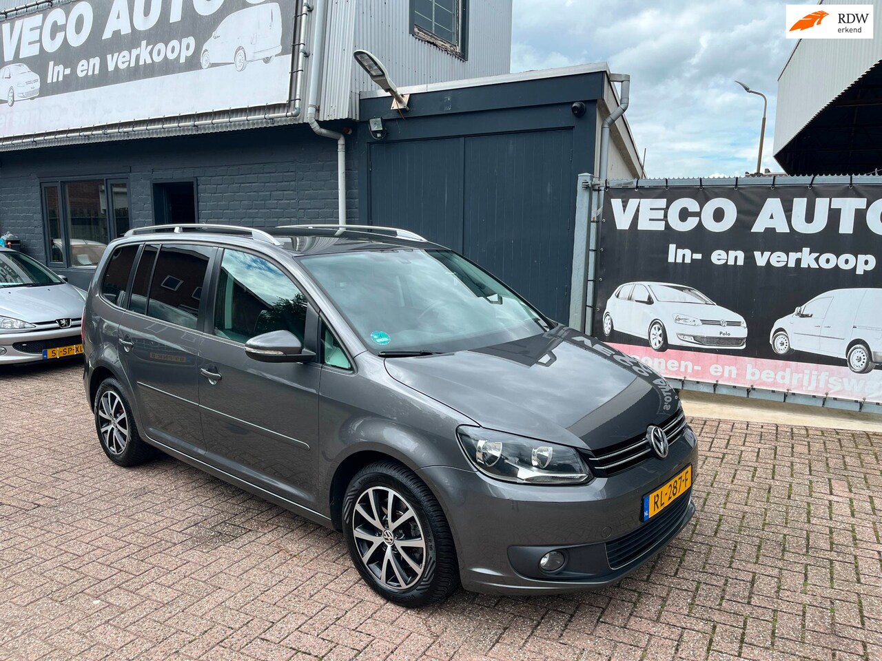 Volkswagen Touran - 2.0 TDI Highline BlueMotion navi pdc leder nette auto - AutoWereld.nl