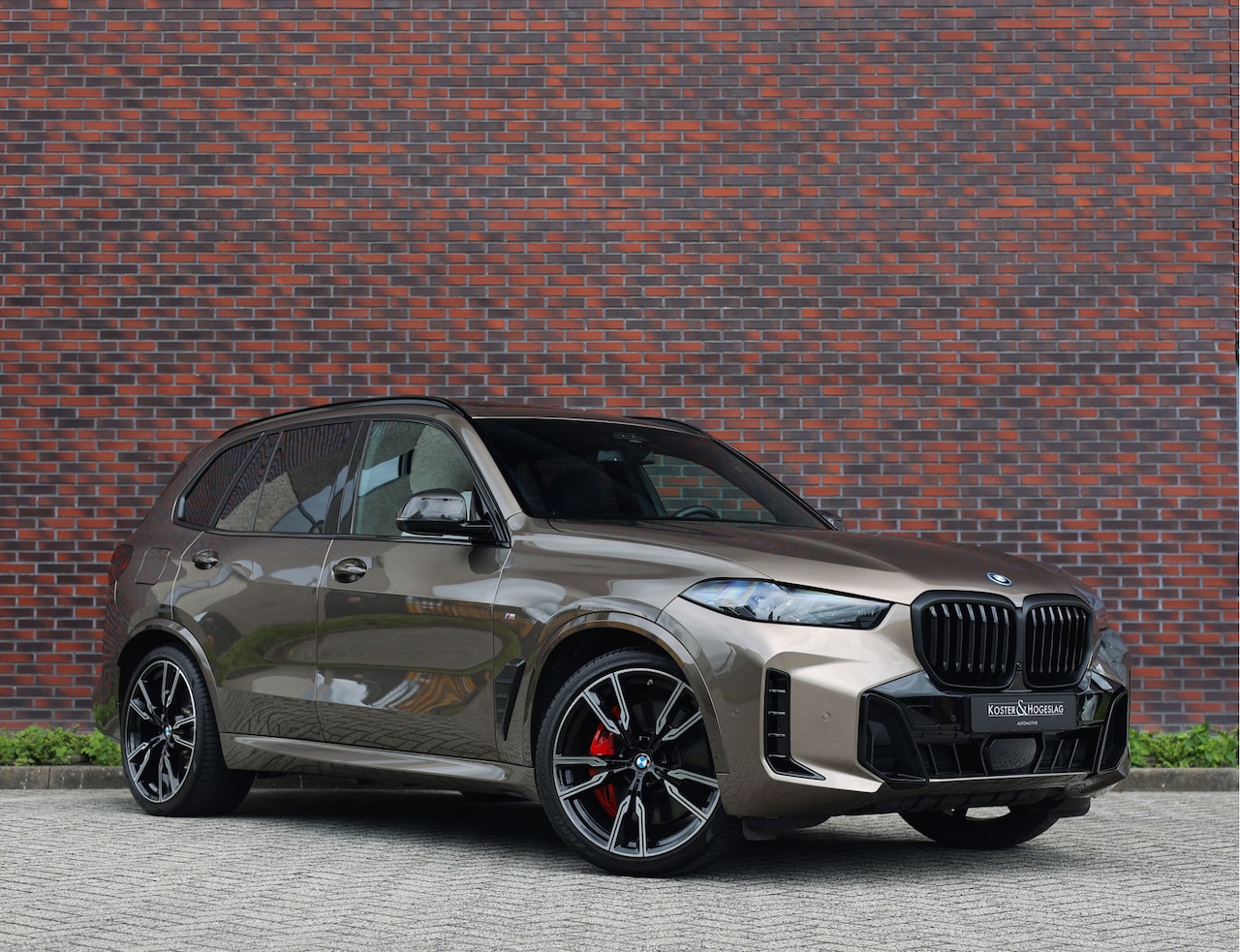 BMW X5 - 50e xDrive | Sepang Bronze - Skylounge - Trekhaak - AutoWereld.nl