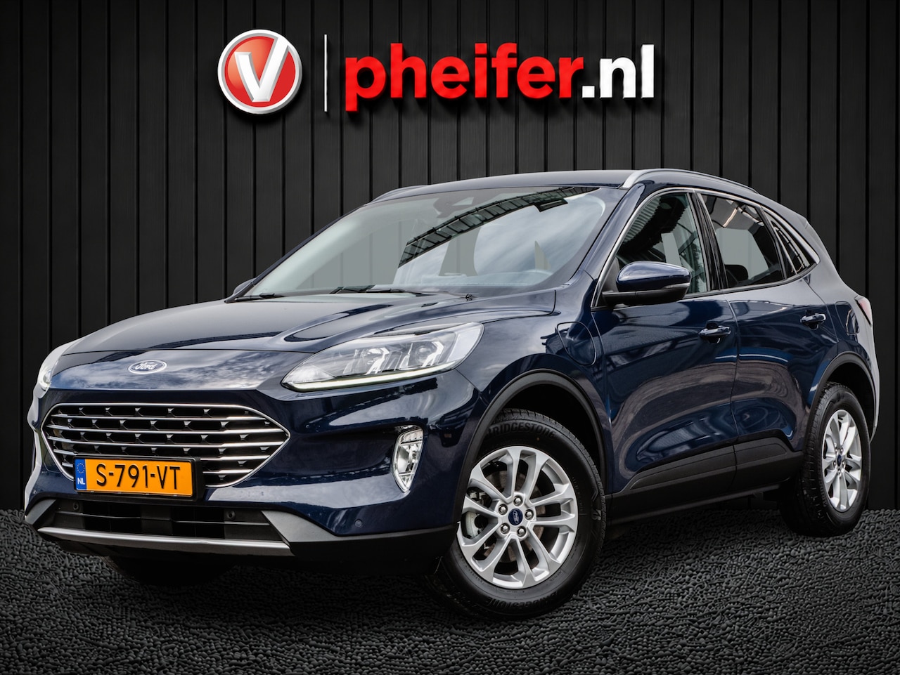 Ford Kuga - 2.5 PHEV Titanium Camera/ Stoel-stuurverwarming/ DAB+/ Carplay/ Pdc v+a - AutoWereld.nl