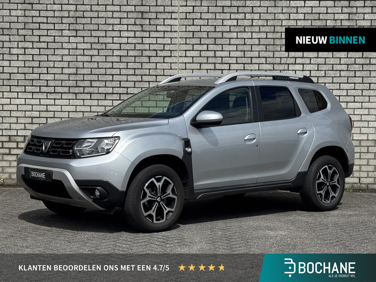 Dacia Duster - 1.0 TCe Prestige | Achteruitrijcamera | Navigatie | Climate Control | Bluetooth | - AutoWereld.nl