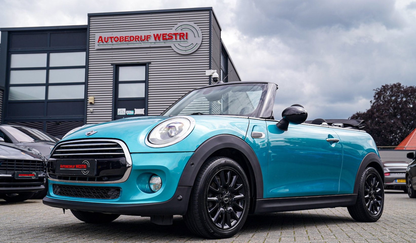 MINI Cabrio - 1.5 Cooper Pepper Serious Business | Stoelverwarming | Navigatie | Keyless Go - AutoWereld.nl