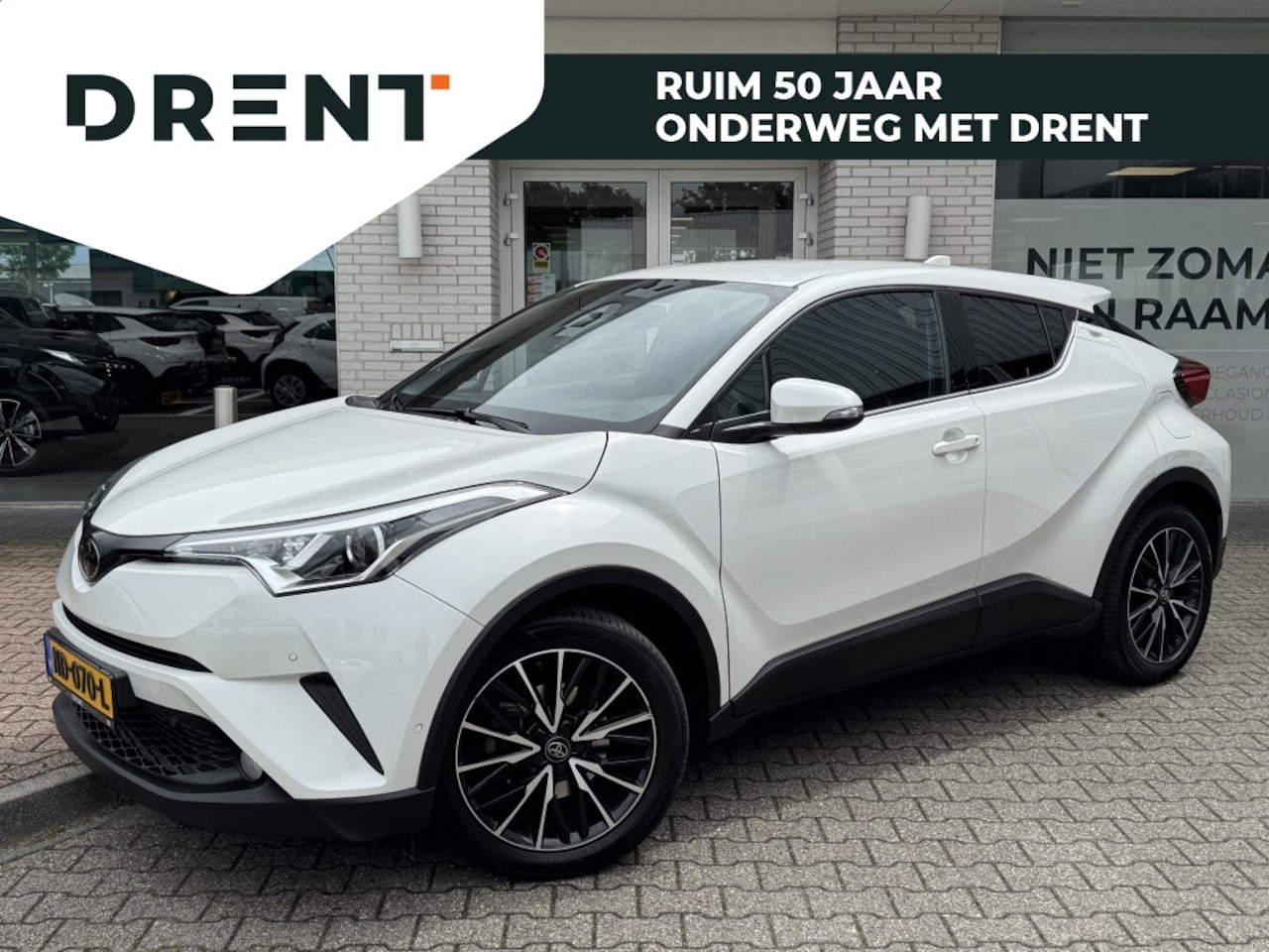 Toyota C-HR - 1.2 Executive | 1300KG Trekgew. | Trekhaak | Navi | Stoelverwarm - AutoWereld.nl