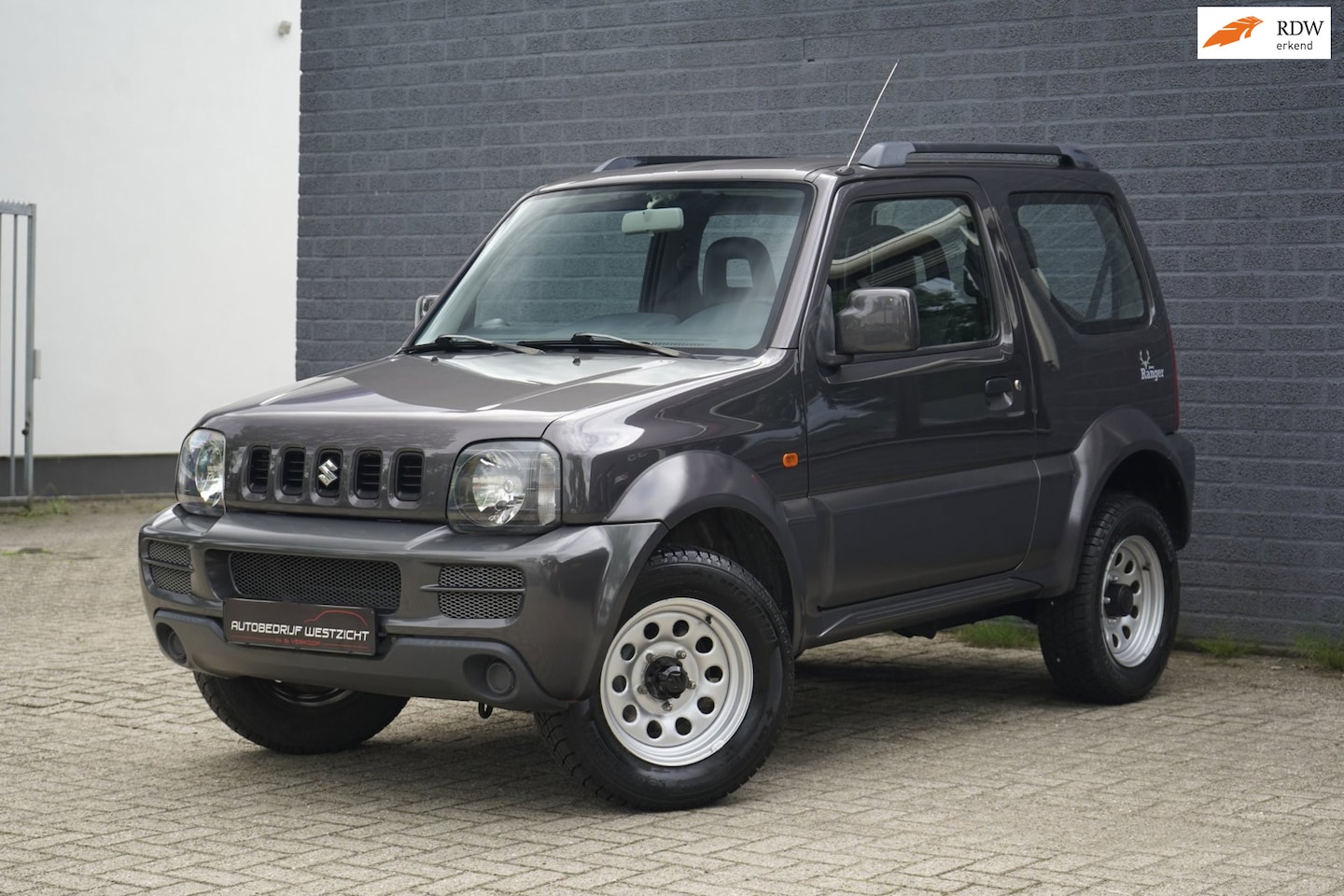 Suzuki Jimny - 1.3 JLX 1.3 JLX, 4x4, Trekhaak, 1ste eigenaar! 4WD - AutoWereld.nl