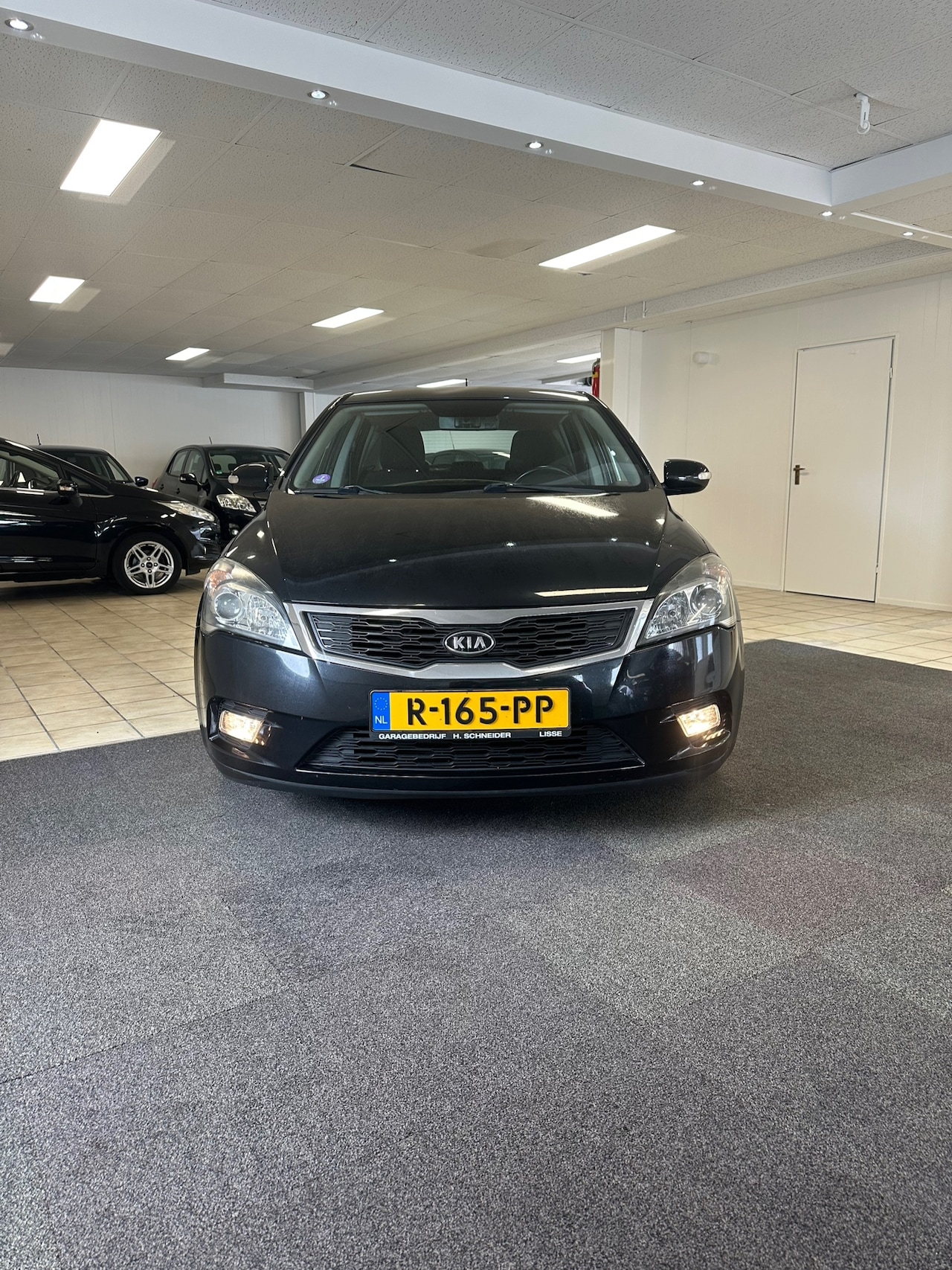 Kia Cee'd Sporty Wagon - Kia.Erste eigenaar .Airco 1.4 CVVT X-tra - AutoWereld.nl